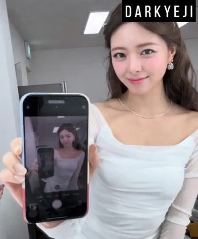Yuna - shows boobs